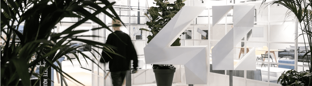 Interior view of the facilities with plants and a logo 42 - 42 Lisboa (Portugal)