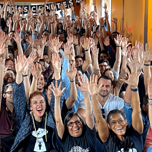 Crowd of happy students with arms in the air - 42 São Paulo (Brazil)