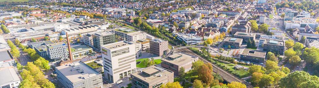Panoramic view of the city of Heilbronn with buildings and green spaces (Germany)