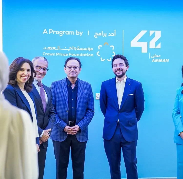 Tina Sweiss (right) and His Majesty the Crown Prince Hussein Bin Abdallah (centre-right).